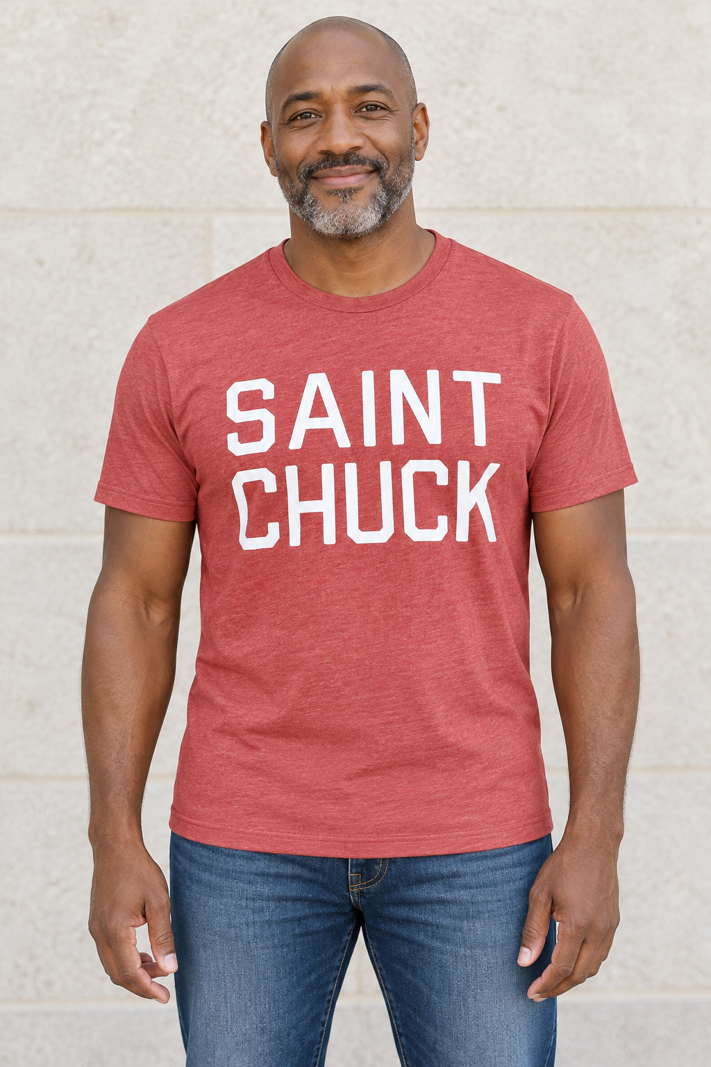 AI-generated front-view mockup of a man wearing the Heather Red SAINT CHUCK tee